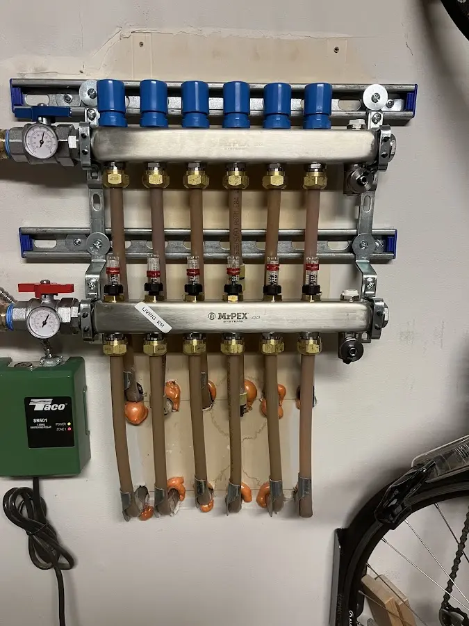 Plumber performing Gas Leak Detection at a residential property in Farmington Hills