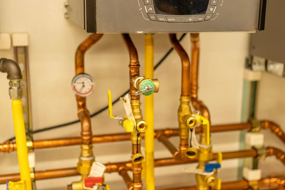 Licensed technician providing Backflow Prevention for a homeowner in Farmington Hills